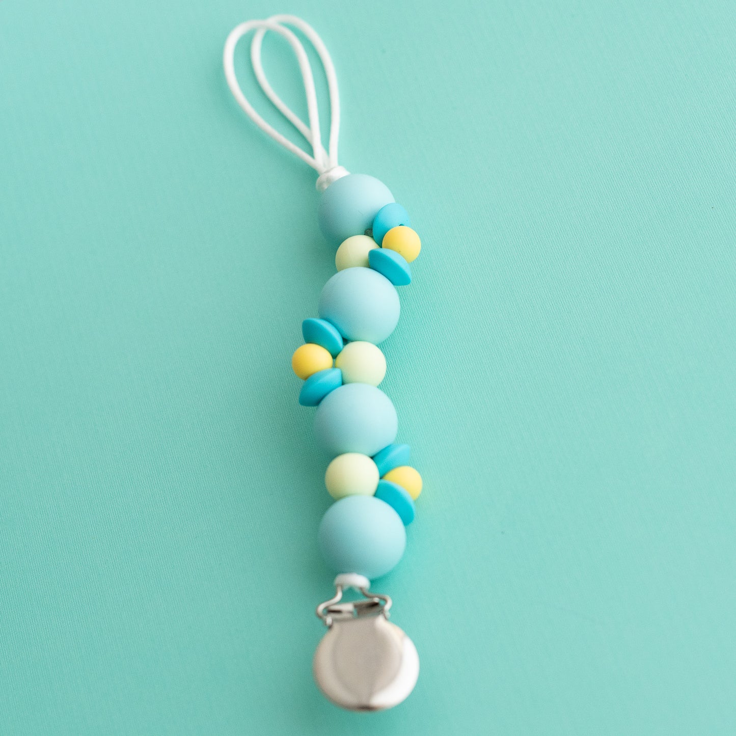 Shop the Image Beach Glass Pacifier Clip from Cara & Co Craft Supply