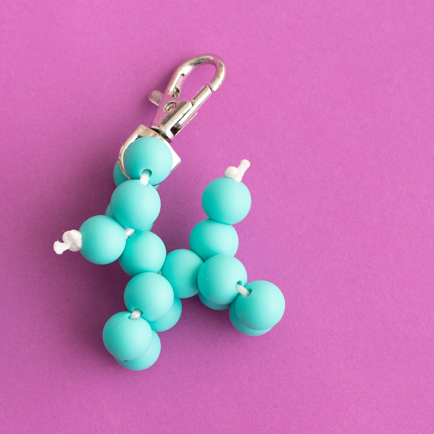 Shop the Image Turquoise Balloon Dog Silicone Beads