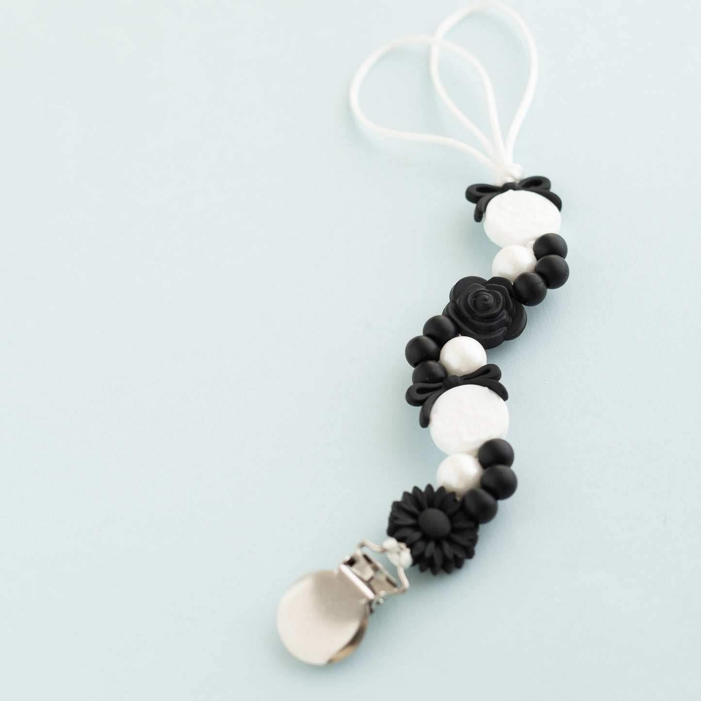 Posh Petal Pacifier Clip shop the image silicone beads