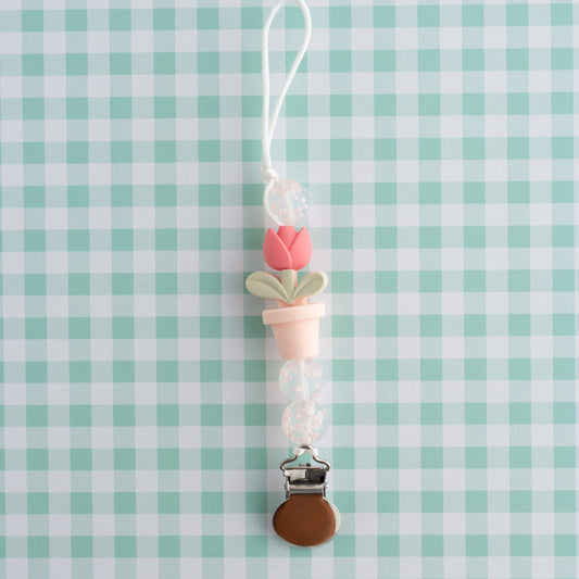 Shop the Image Plant Lady Baby Pacifier Clip from Cara & Co Craft Supply