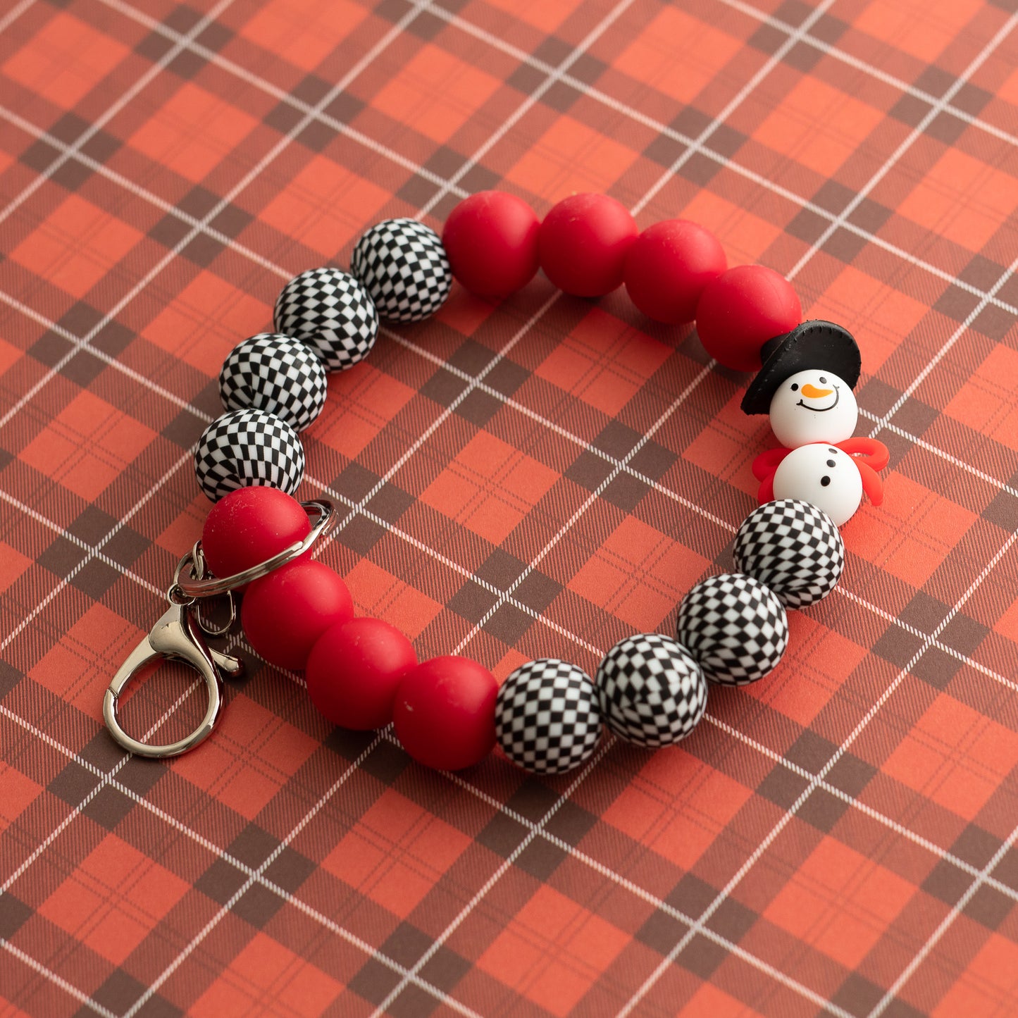 Jolly Snowman Wristlet Shop the Image with silicone beads