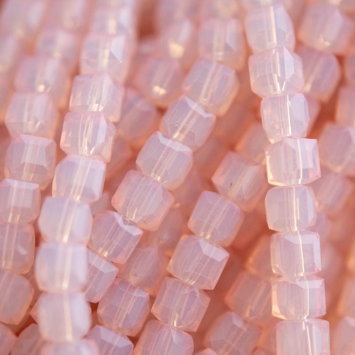 Glass Beads Glass Faceted Cubes Frosted Pink from Cara & Co Craft Supply