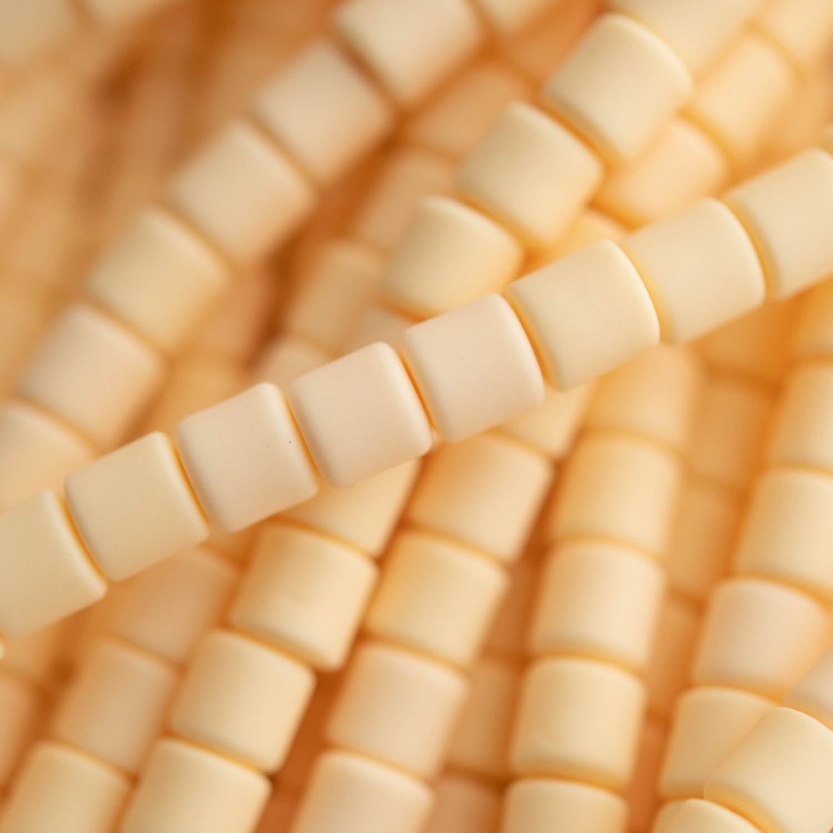 Heishi Bead Strands Polymer Clay Beads - Cylinder Vanilla from Cara & Co Craft Supply