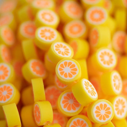 Heishi Bead Strands Polymer Clay Citrus from Cara & Co Craft Supply