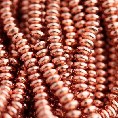 Hemitite Beads Hematite - Rondelle Rose Gold from Cara & Co Craft Supply