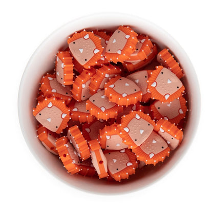 Silicone Focal Beads Dinosaurs Tangerine Orange from Cara & Co Craft Supply