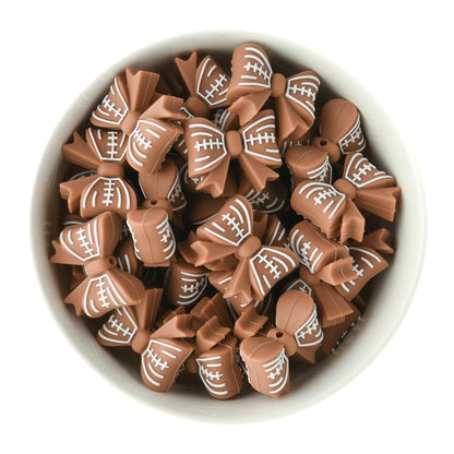 Silicone Focal Bead Football Bow for silicone crafting from Cara & Co Crafting Supplies