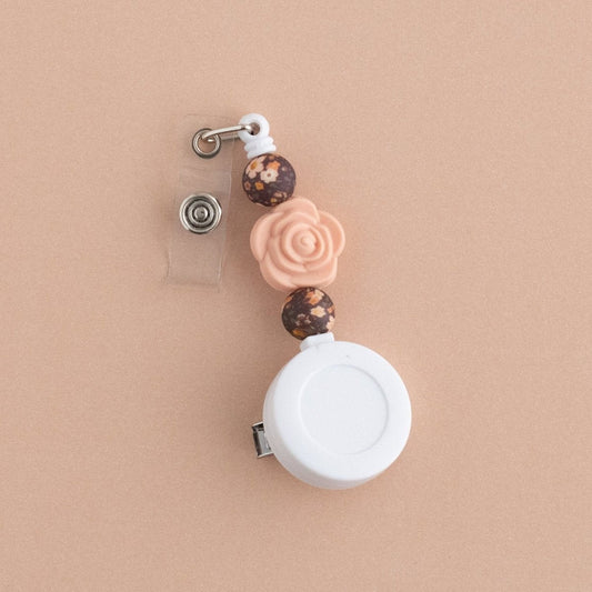 Shop the Image Coming Up Roses Badge Reel from Cara & Co Craft Supply