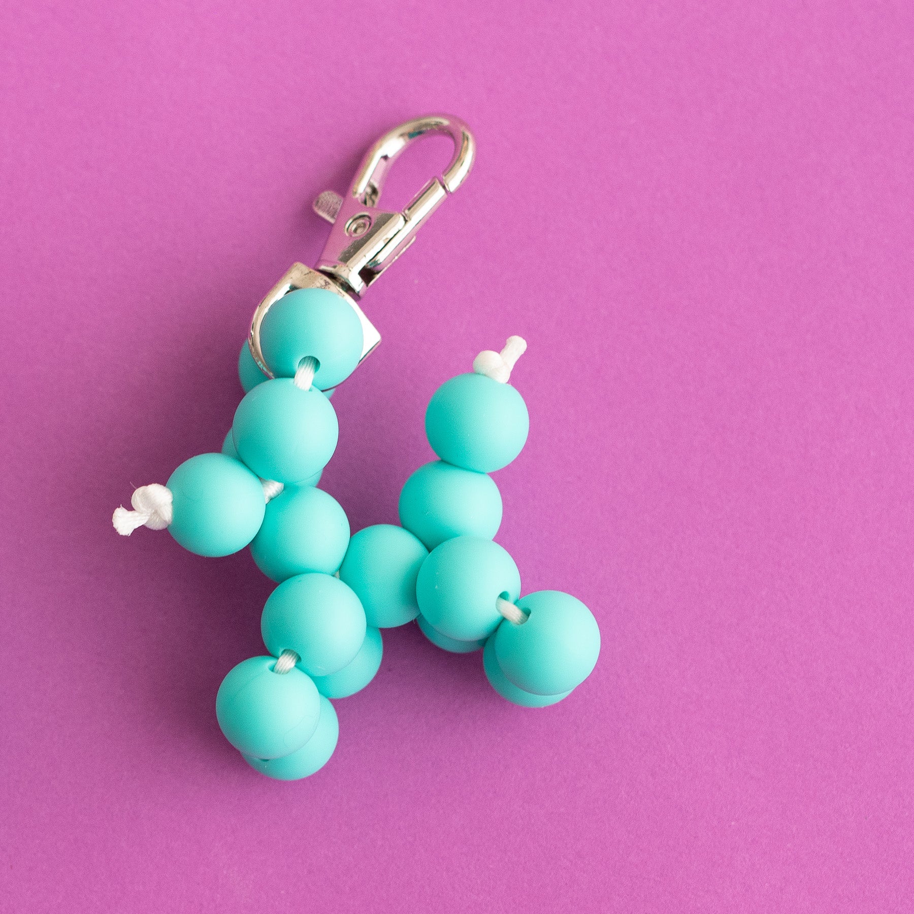 Shop the Image Turquoise Balloon Dog Silicone Beads
