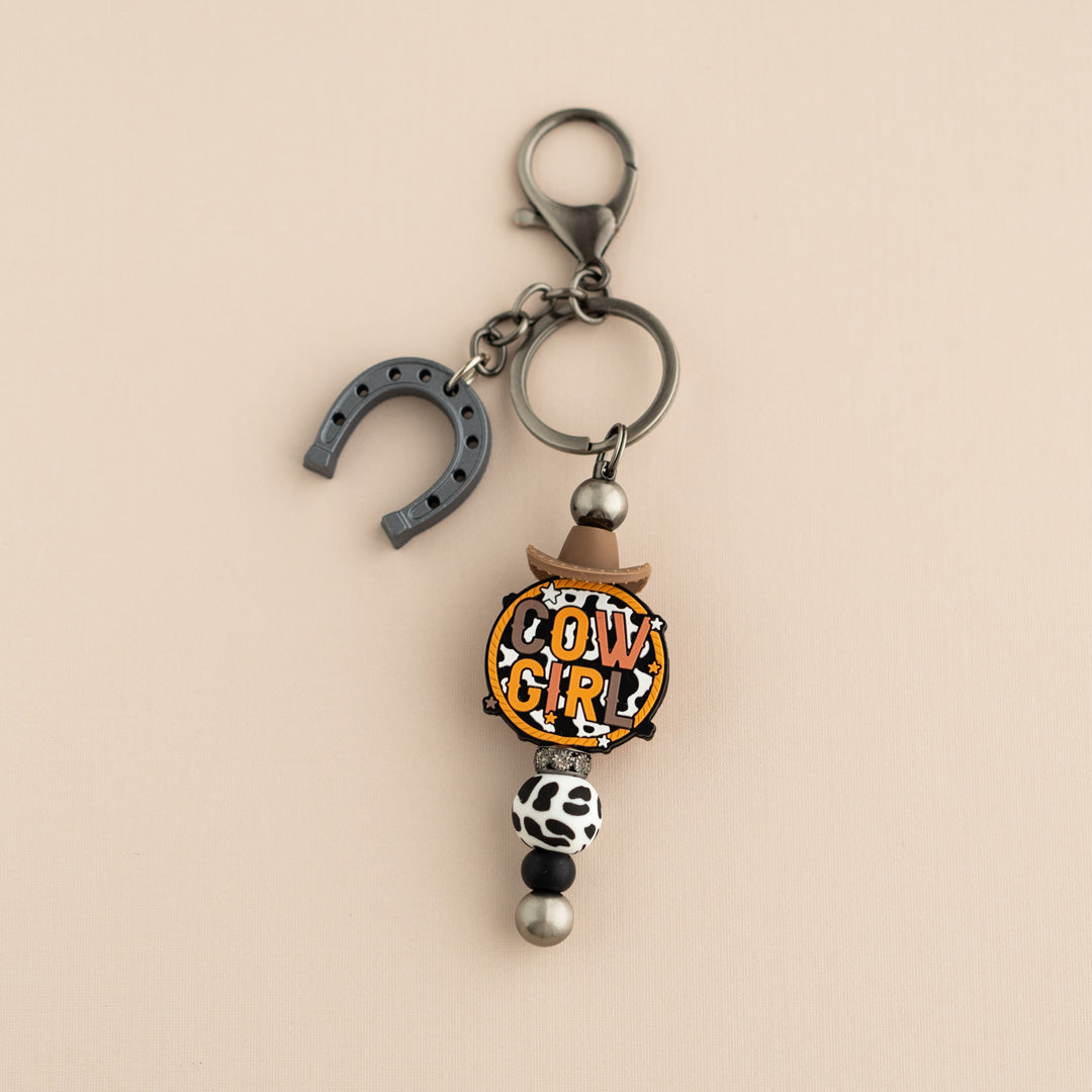 Shop The Image YeeHaw Cow Girl Keychain from Cara & Co Craft Supply