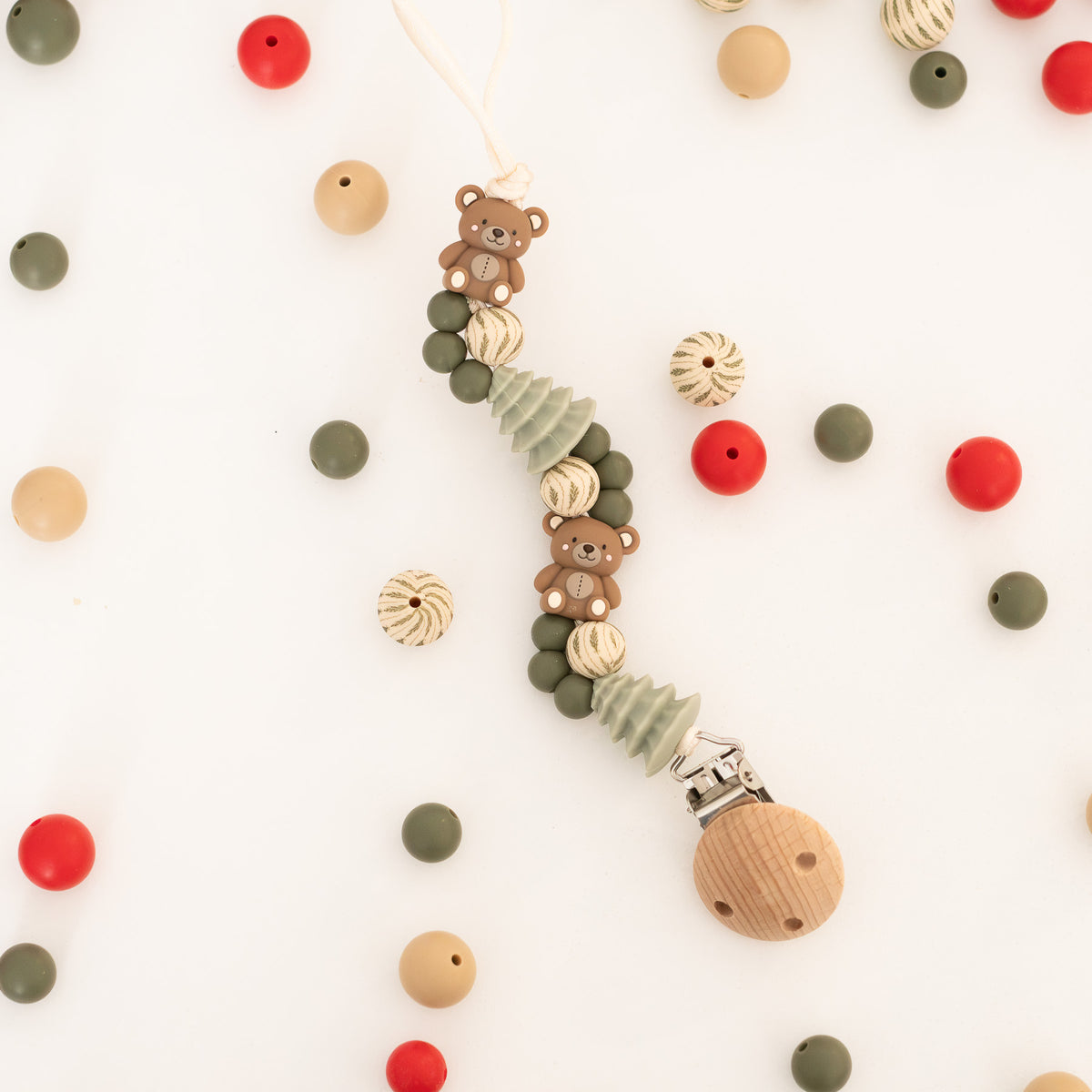Cozy Forest Teddy Pacifier Clip Shop the Image for silicone bead crafting from Cara & Co Craft Supply