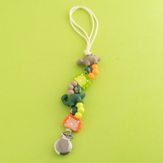 CuddleSaurus Pacifier Clip shop the image silicone beads