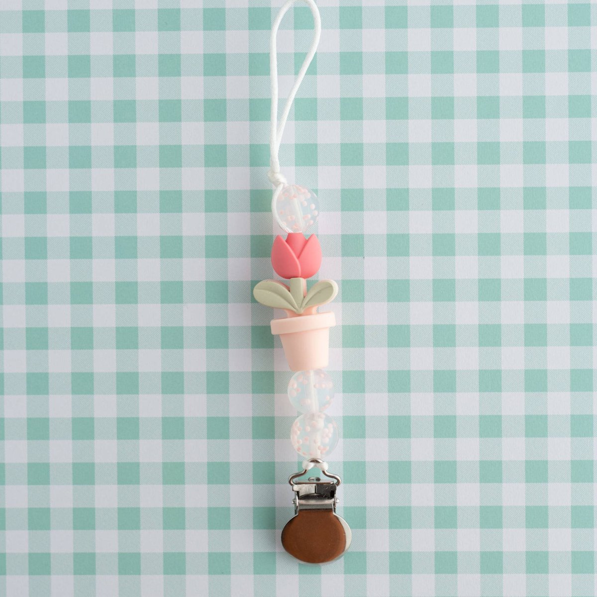 Shop the Image Plant Lady Baby Pacifier Clip from Cara & Co Craft Supply