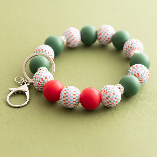 Tinsel Twist Wristlet Shop the Image using silicone beads