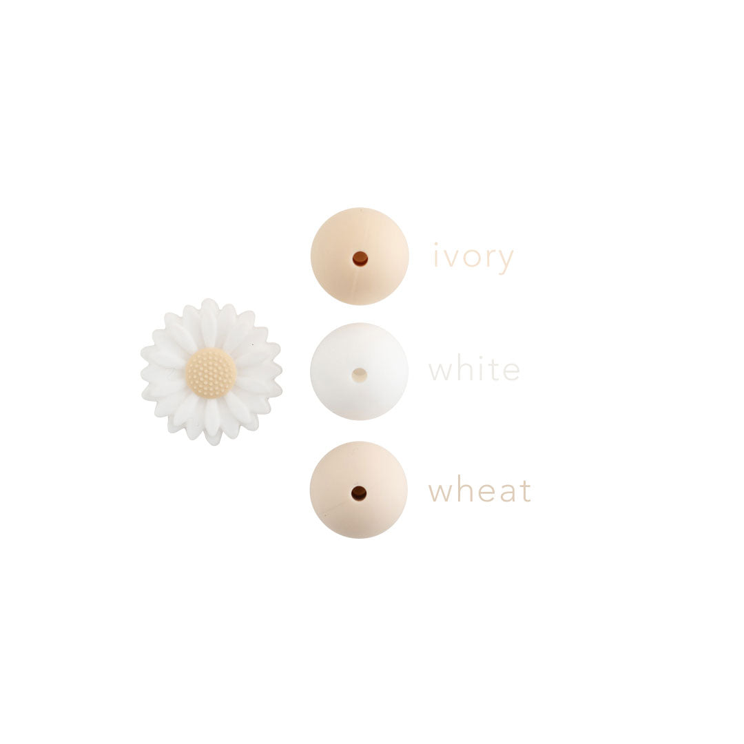 White Daisy silicone focal bead color comparison