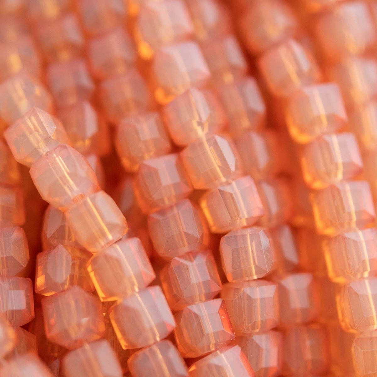 Glass Beads Glass Faceted Cubes Pale Orange from Cara & Co Craft Supply