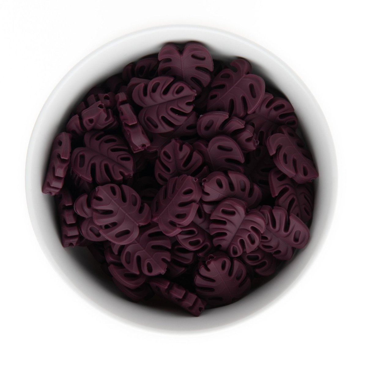 Silicone Focal Beads Monstera Leaves Mystic Mulberry from Cara & Co Craft Supply